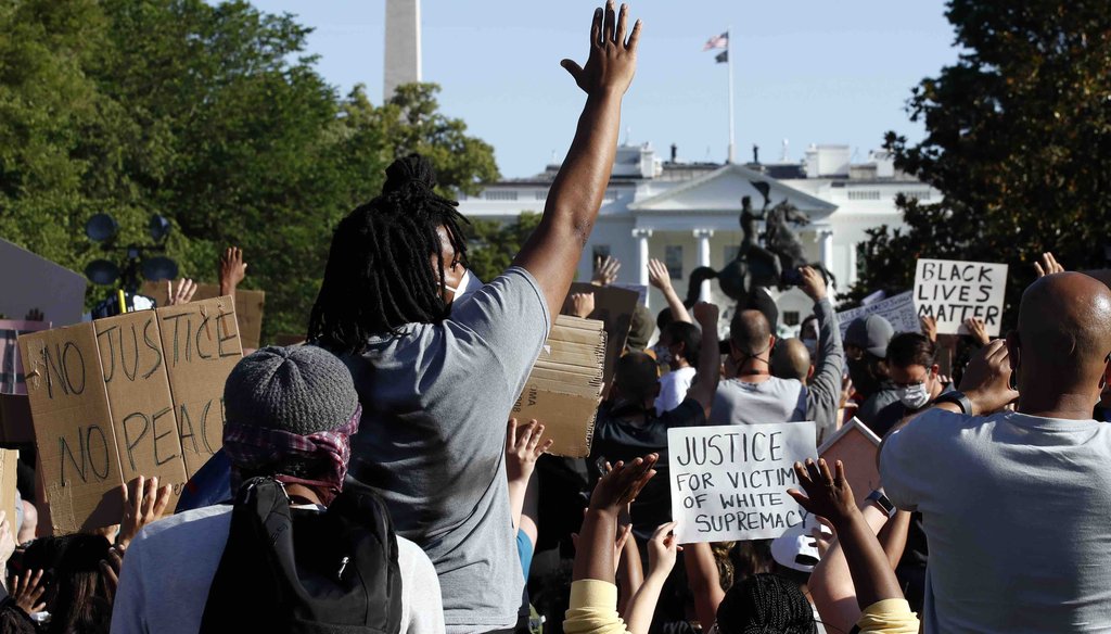 Demonstrators gather in Lafayette Park to protest the death of George Floyd on June 1, 2020, near the White House in Washington. (AP)