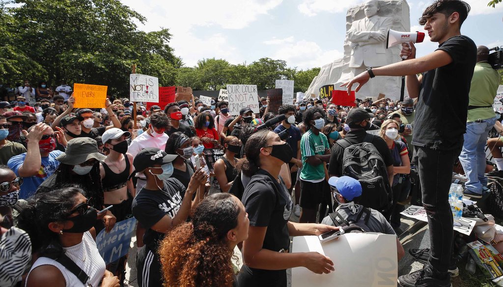 Demonstrators protest on June 4, 2020, at the Martin Luther King Jr. Memorial in Washington, over the death of George Floyd. (AP)