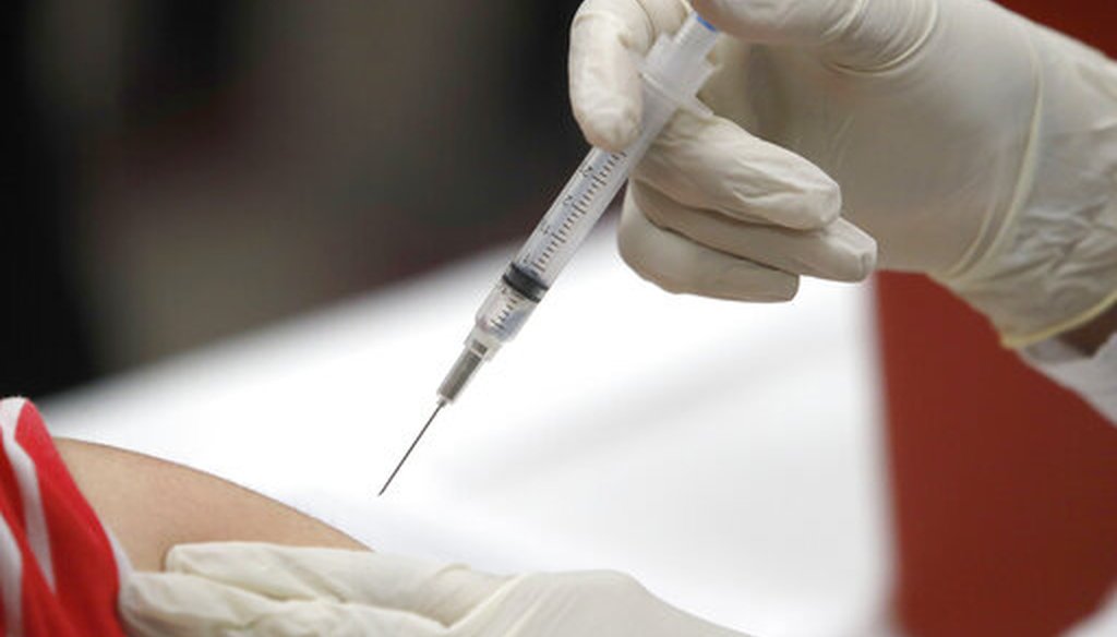 This Jan. 23, 2020 file photo shows a patient receiving a flu vaccination in Mesquite, Texas. (AP Photo)