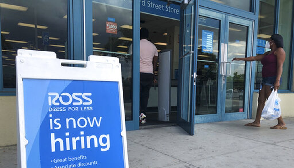 A "Now Hiring" sign sits outside a Ross Dress for Less store in North Miami Beach, Fla., on July 8, 2020. (AP)