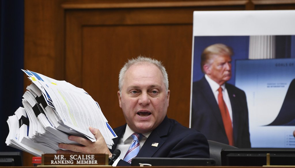 Rep. Steve Scalise, R-La., holds up documents detailing President Donald Trump's plan for dealing with the Coronavirus during a House Subcommittee on the Coronavirus crisis hearing, Friday, July 31, 2020 on Capitol Hill. (Kevin Dietsch/Pool via AP)