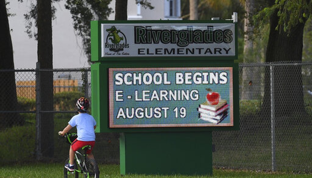 A sign outside a Broward County, Fla., elementary school advertises the start of virtual learning. (AP)