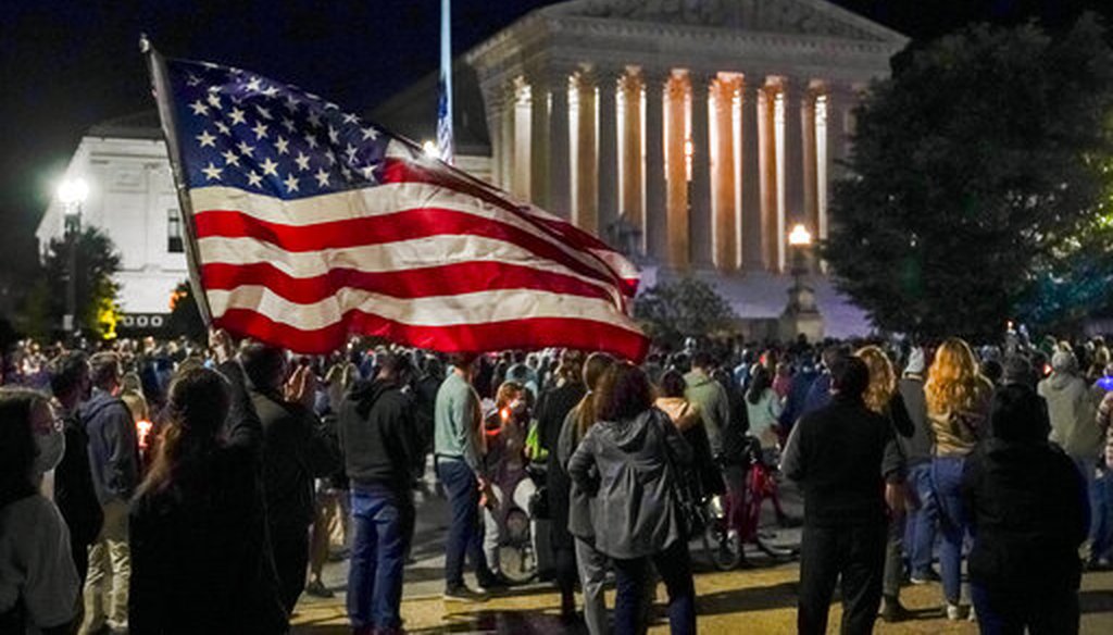 People gather at the Supreme Court on Sept. 19, 2020, to honor the late Justice Ruth Bader Ginsburg. (AP)