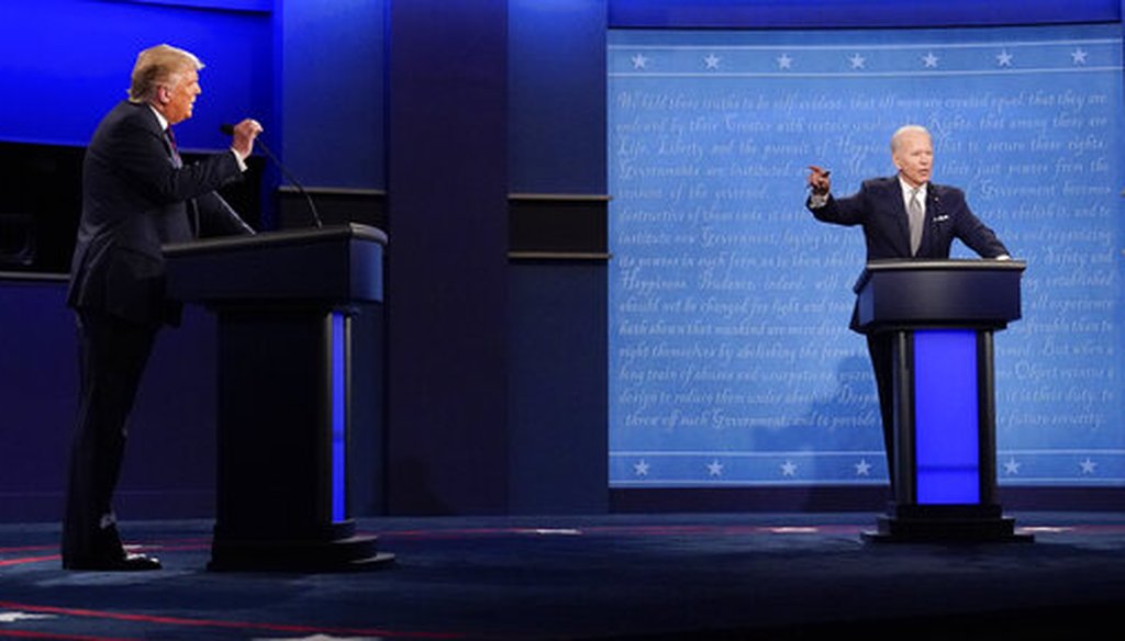 President Donald Trump, left, and Democratic presidential candidate and former Vice President Joe Biden, right, gesture during the first presidential debate on Sept. 29, 2020, at Case Western University and Cleveland Clinic, in Cleveland, Ohio. (AP/Cortez