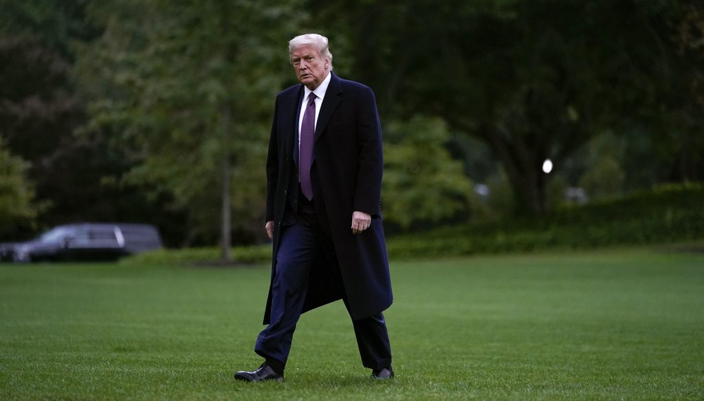 In this Oct. 1, 2020 file photo, President Donald Trump walks from Marine One to the White House in Washington as he returns from Bedminster, N.J. (AP)
