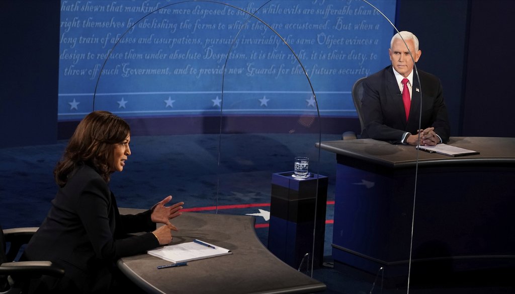 Vice President Mike Pence looks at Democratic vice presidential candidate Sen. Kamala Harris, D-Calif., as she answers a question during the vice presidential debate Oct. 7, 2020, at Kingsbury Hall on the campus of the University of Utah. (AP)