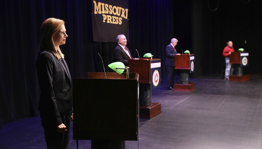 Missouri gubernatorial candidates, from left, State Auditor Nicole Galloway, Libertarian candidate Rik Combs, Gov. Mike Parson, and Green Party candidate Jerome Bauer, take the stage for the Missouri gubernatorial debate on Oct. 9. (AP)