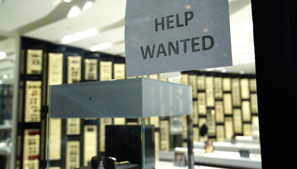 A Help Wanted sign is posted at a store at Brickell City Centre on Nov. 6, 2020, in Miami. (AP/Sladky)