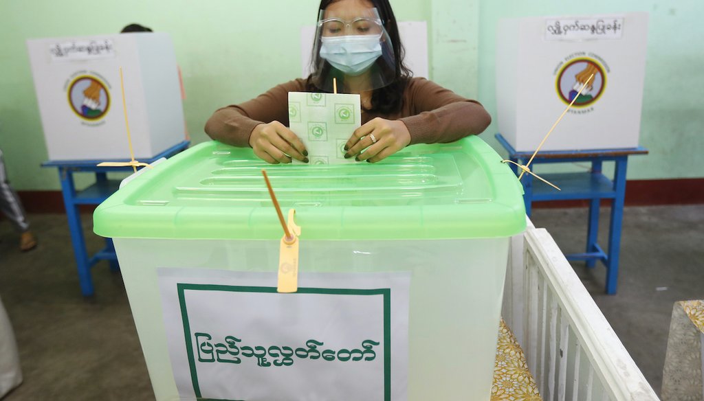 A voter casts a ballot Nov. 8, 2020, at a polling station in Naypyitaw, Myanmar. (AP)