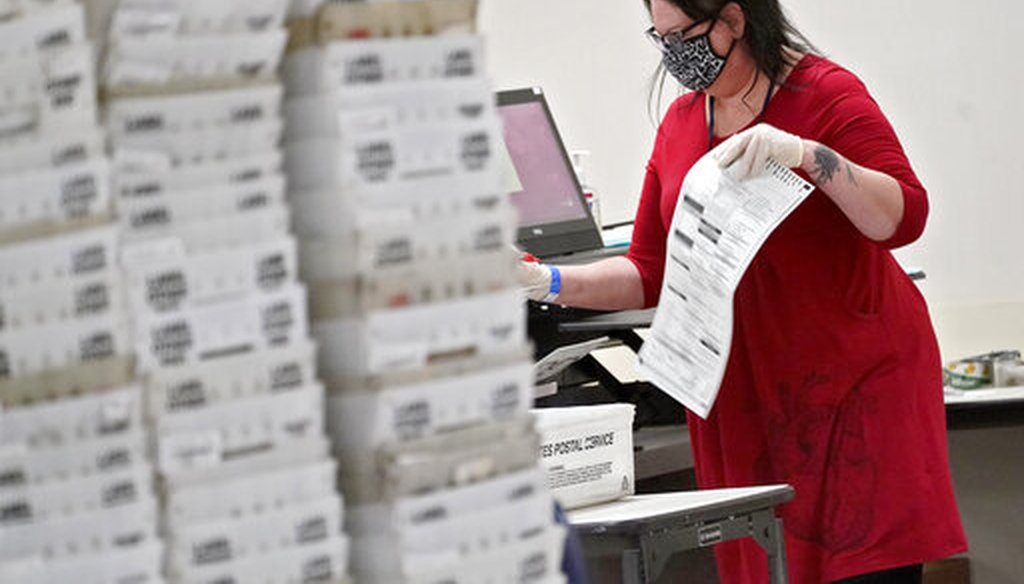 Arizona election officials count ballots inside the Maricopa County Recorder's Office in Phoenix on Nov. 6, 2020. (AP)