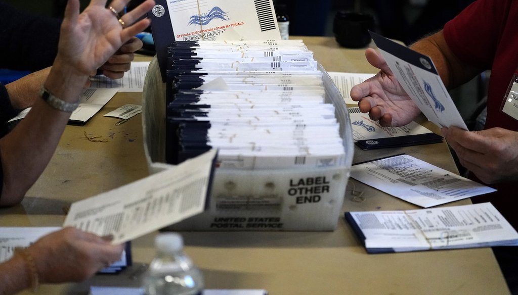 Chester County election workers process mail-in and absentee ballots for the 2020 general election at West Chester University in West Chester, Pa., on Nov. 4, 2020. (AP)