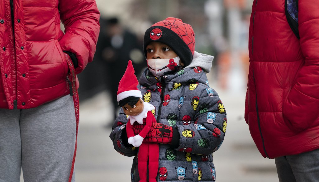 A student arrives at P.S. 134 in New York for in-school learning. (AP)