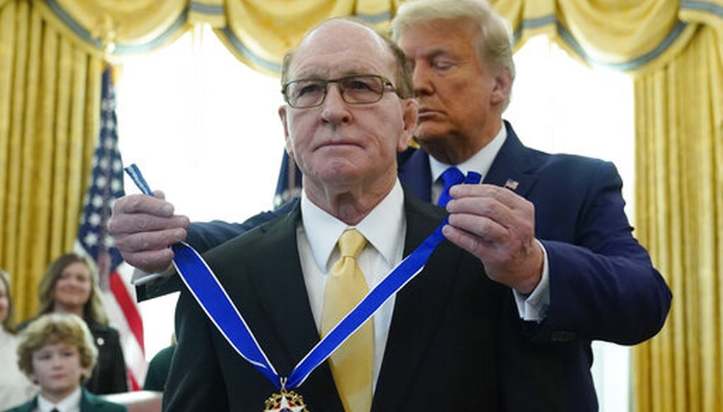 President Donald Trump awards the Presidential Medal of Freedom, the highest civilian honor, to Olympic gold medalist and former University of Iowa wrestling coach Dan Gable on Dec. 7, 2020. (AP)