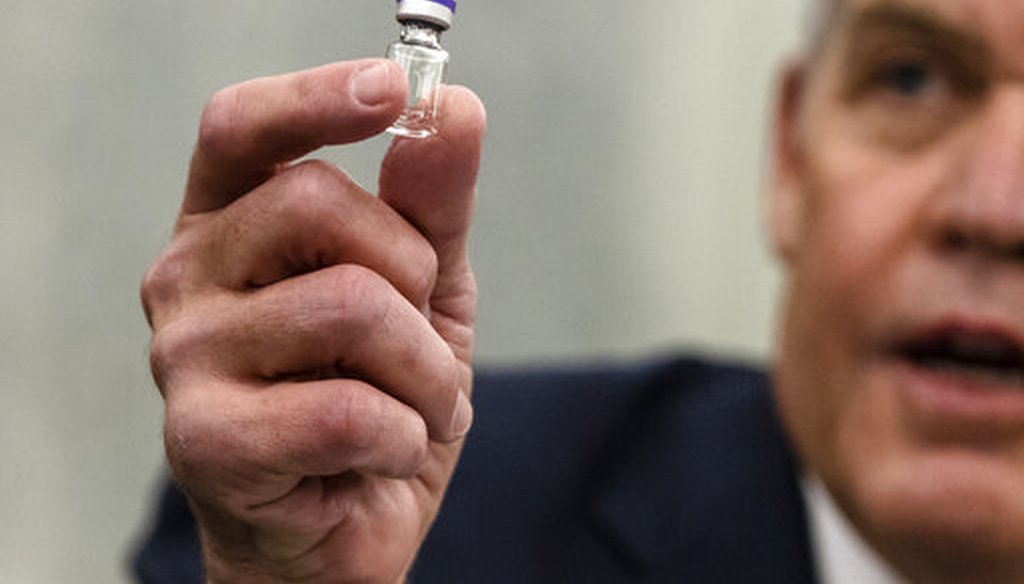 United Parcel Service President of Global Healthcare Wesley Wheeler holds an example of the vial that will be used to transport the Pfizer COVID-19 vaccine as he speaks at a Senate Transportation subcommittee hearing Dec. 10, 2020. (AP)