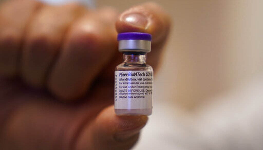 The Pfizer-BioNTech COVID-19 vaccine is held at Kaiser Permanente Los Angeles Medical Center in Los Angeles on Dec. 14, 2020. (AP/Hong)