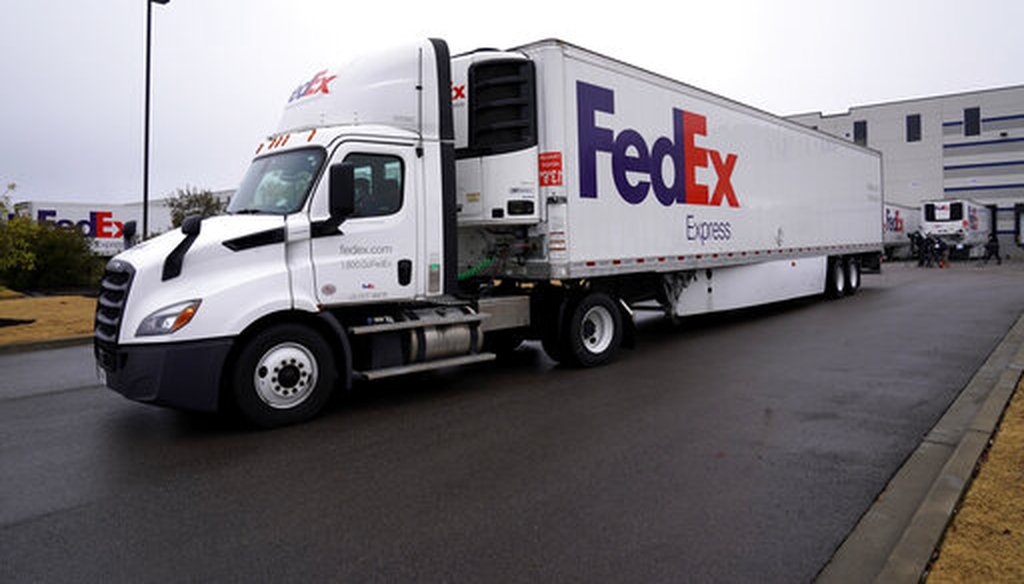 A FedEx truck in Olive Branch, Miss. on Dec. 20, 2020. FedEx was one of 55 companies cited in a recent report as having paid no federal income taxes. (AP)