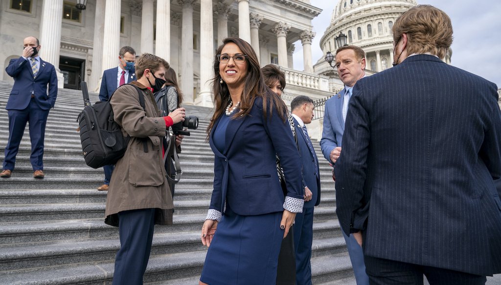 Rep. Lauren Boebert, R-Colo., center, smiles after joining other freshman Republican House members for a group photo at the Capitol in Washington, Jan. 4, 2021. (AP)