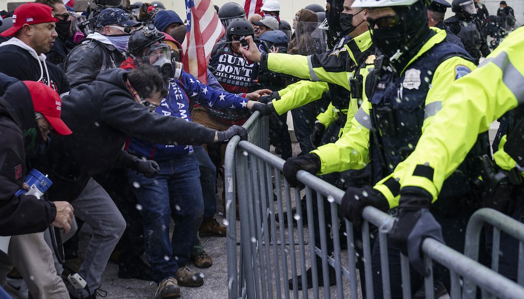 Trump supporters try to break through a police barrier on Jan. 6, 2021, at the Capitol in Washington. (AP)