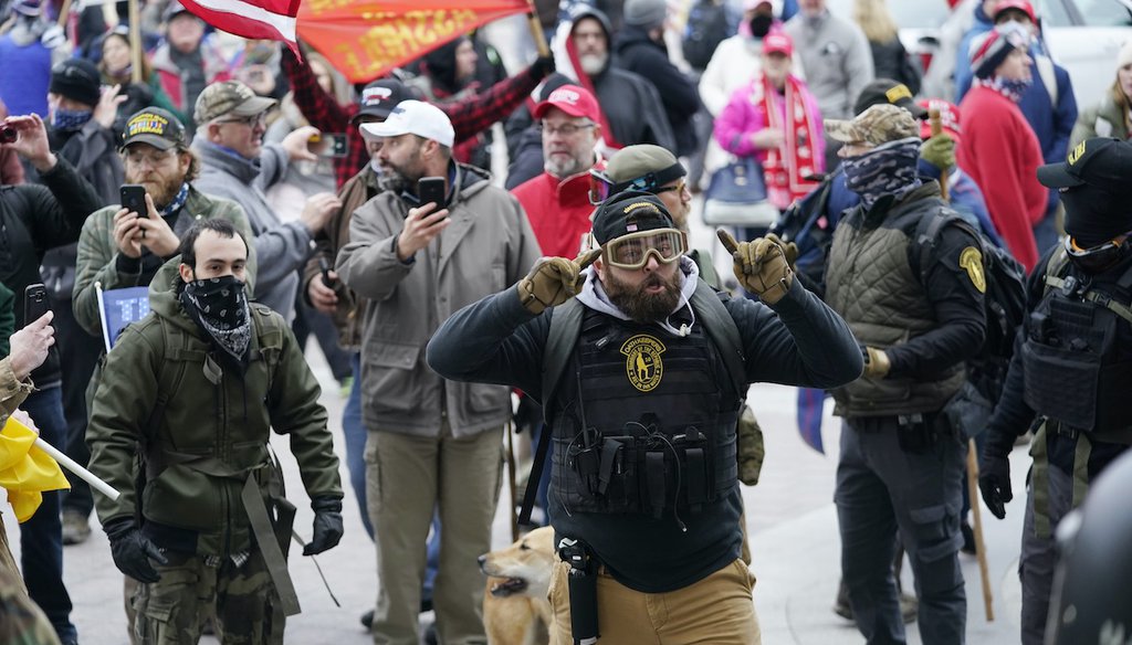Rioters gather outside the Capitol in Washington on Jan. 6, 2021. (AP/Ceneta)
