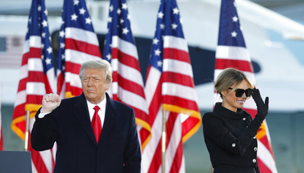 President Donald Trump and First Lady Melania Trump wave to supporters after giving a farewell speech at Joint Base Andrews on Jan. 20, 2021. (AP)