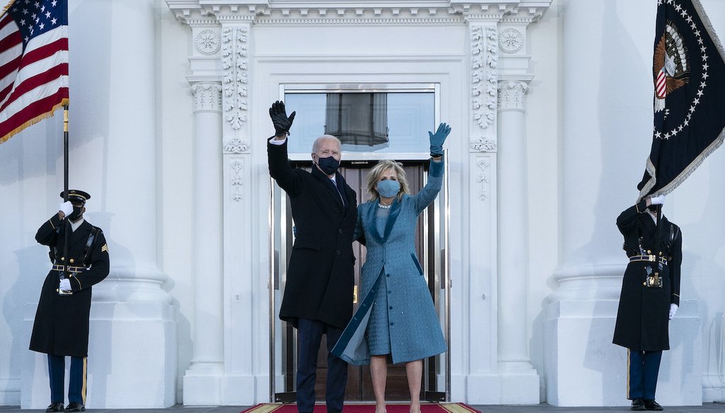 President Joe Biden and first lady Jill Biden wave as they arrive at the North Portico of the White House, Jan. 20, 2021. (AP)