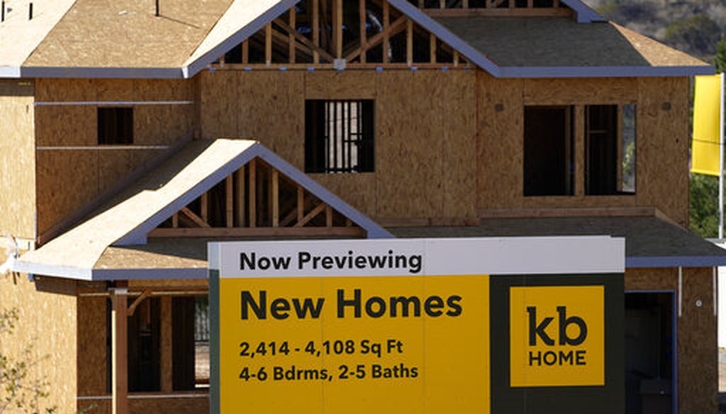 There's strong demand for homes, but high lumber prices are limiting builders' ability to capitalize, analysts say. (AP)