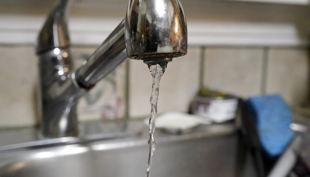 Water pours out of the faucet on Feb. 20, 2021, in Dallas. (AP)