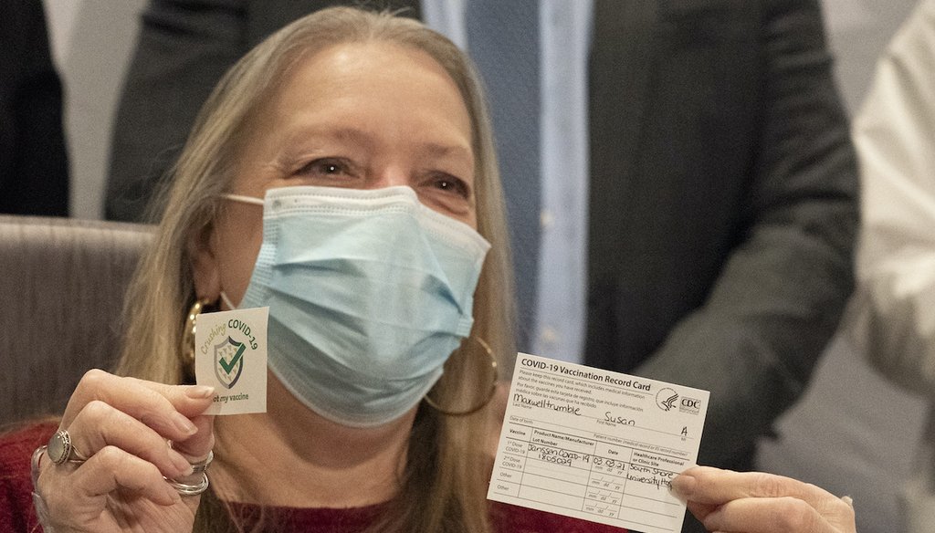 Susan Maxwell Trumble displays her vaccination card after being inoculated with the Johnson & Johnson COVID-19 vaccine at South Shore University Hospital, March 3, 2021, in Bay Shore, N.Y. (AP)