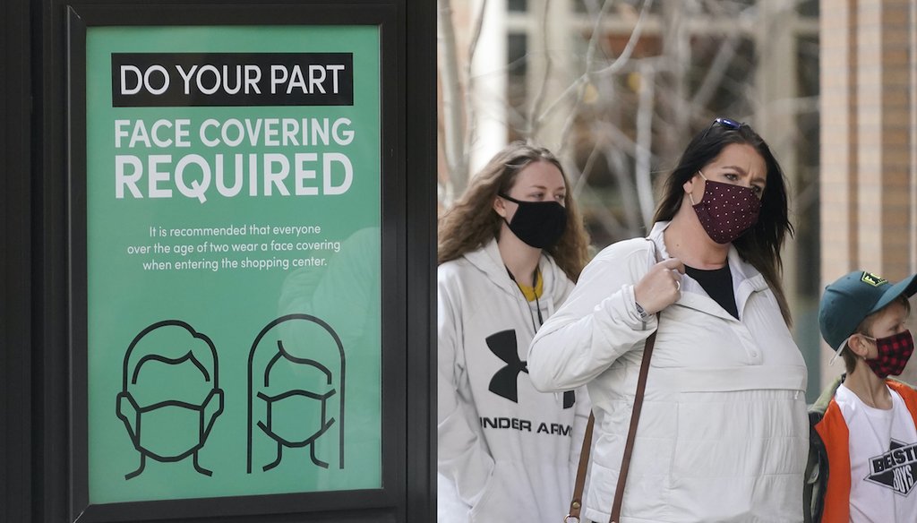 A sign requiring face masks is seen at City Creek Center, March 8, 2021, in Salt Lake City.  (AP)
