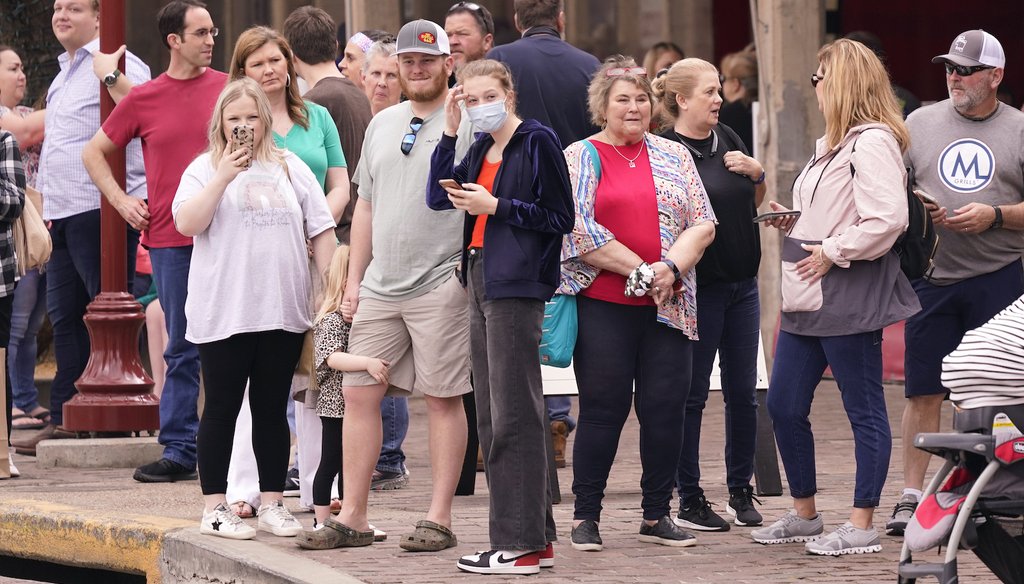 Spectators wait to watch a cattle drive demonstration at the Fort Worth Stockyards Thursday, March 11, 2021, in Fort Worth, Texas. Gov. Greg Abbott allowed the state mandates for COVID-19 safety measures to expire so people can forgo masks. (AP)