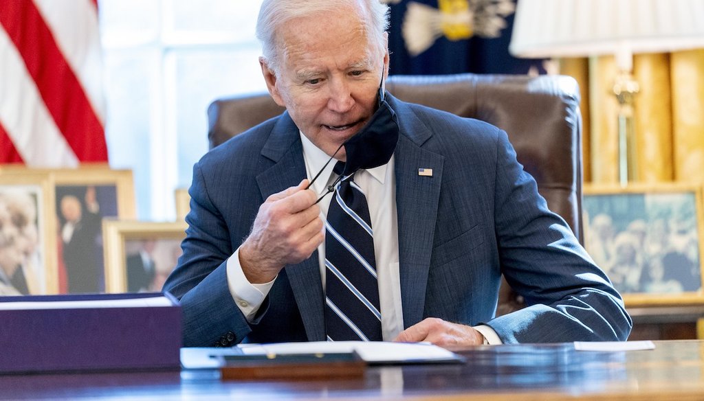 President Joe Biden sits down to sign the American Rescue Plan, a coronavirus relief package, in the Oval Office of the White House, on March 11, 2021. (AP)