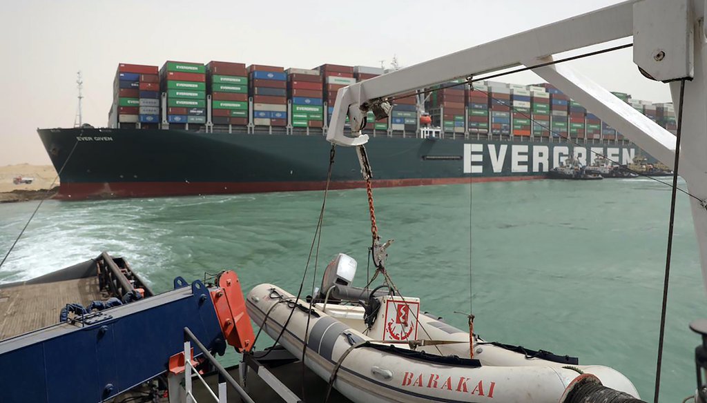 This photo released by the Suez Canal Authority on March 25, 2021, shows the Ever Given, a Panama-flagged cargo ship, after it become wedged across the Suez Canal and blocking traffic in the vital waterway. (Suez Canal Authority via AP)