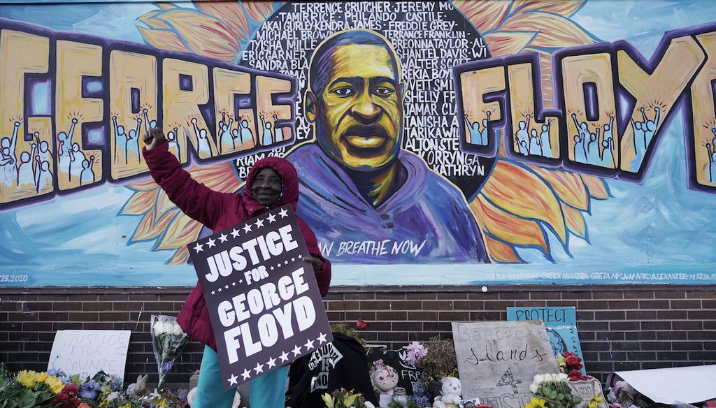 A person reacts in front of a mural near Cup Foods after a guilty verdict was announced at the trial of former Minneapolis police officer Derek Chauvin for the 2020 murder of George Floyd, on April 20, 2021, in Minneapolis. (AP/Gash)