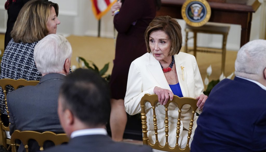 House Speaker Nancy Pelosi, D-Calif., mingles before the COVID-19 Hate Crimes Act, in the East Room of the White House, on May 20, 2021, in Washington. (AP/Vucci)