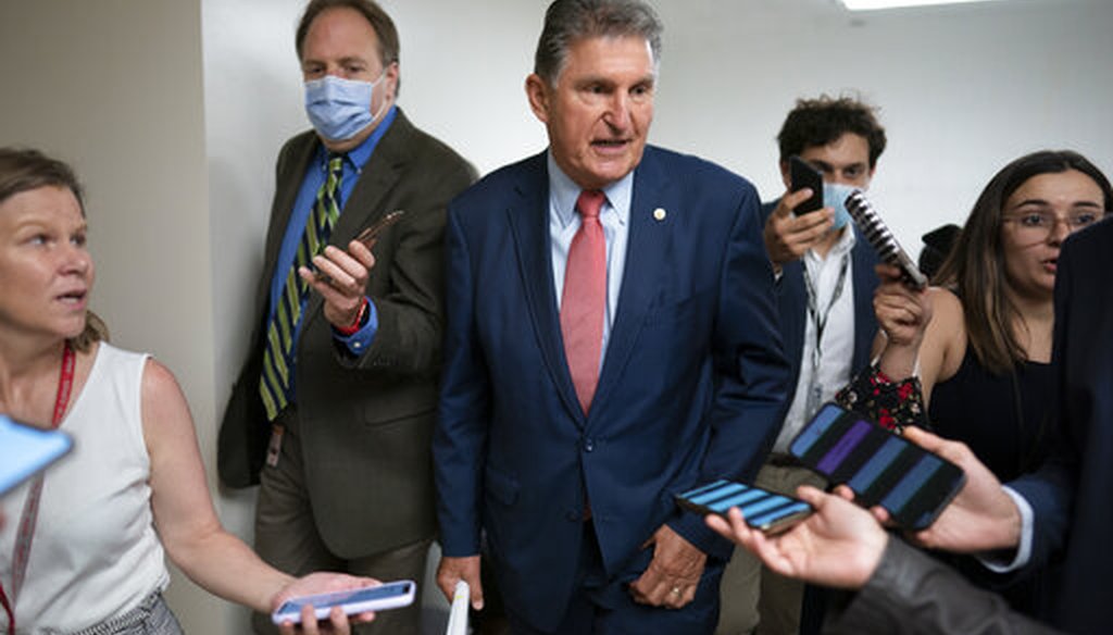 Sen. Joe Manchin, D-W.Va., surrounded by reporters at the Capitol on May 26, 2021. (AP)