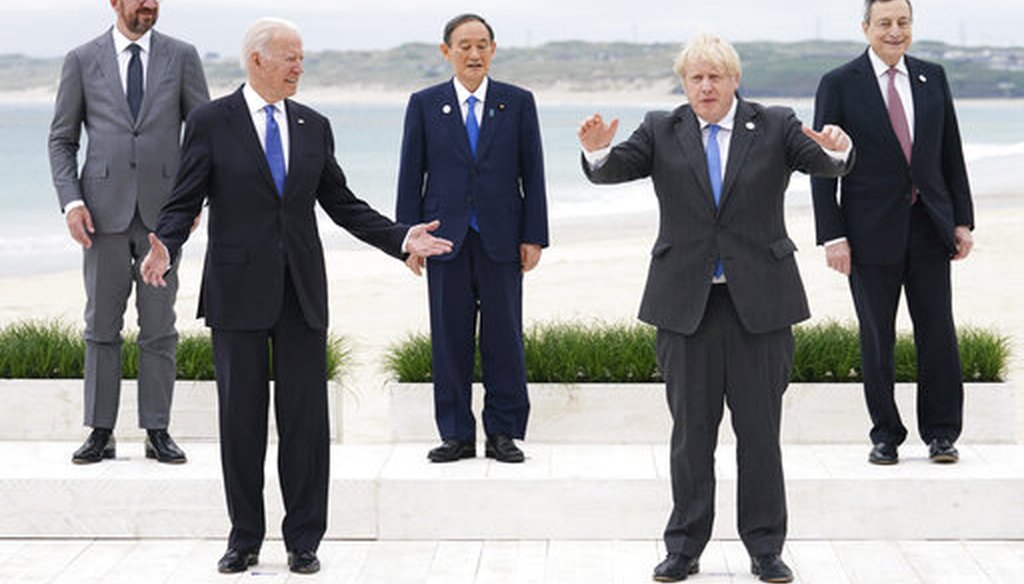 President Joe Biden, front left, and U.K. Prime Minister Boris Johnson, front right, with European Council President Charles Michel, back left, Japan's Prime Minister Yoshihide Suga, back center, and Italy's Prime Minister Mario Draghi.