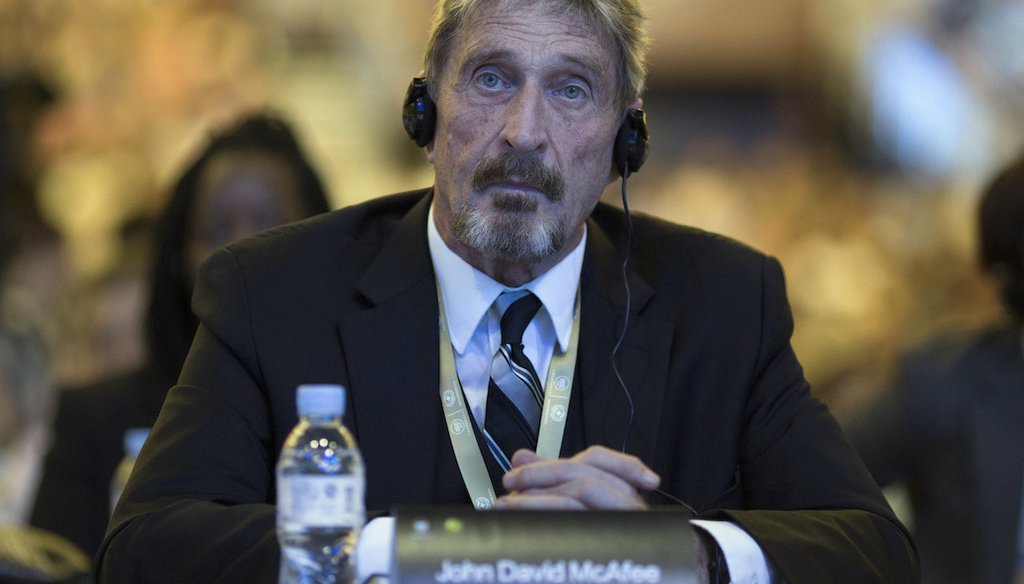 John McAfee, who developed the first commercial antivirus software for computers, appears at the 4th China Internet Security Conference in Beijing, in 2016. (AP)
