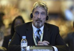 Rumors surrounding John McAfee’s death linked to QAnon conspiracy