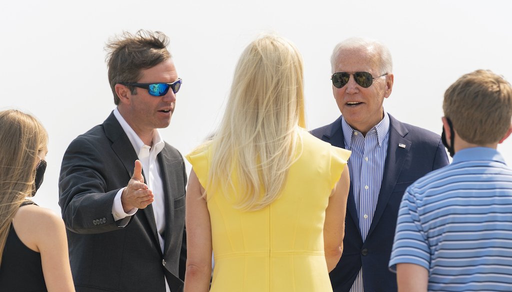 President Joe Biden is greeted by Kentucky Gov. Andy Beshear, his wife Britainy Beshear, and their children Lila and Will Beshear, as he arrives at Cincinnati/Northern Kentucky International Airport in Hebron, Ky., on July 21, 2021. (AP)