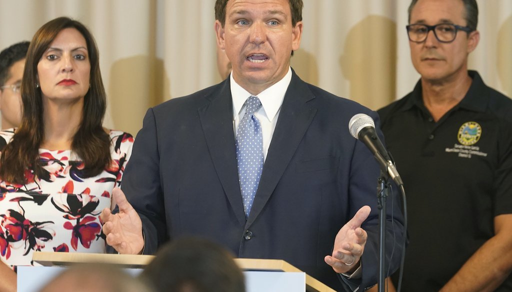 Florida Gov. Ron DeSantis answers questions related to school openings and the wearing of masks, Tuesday, Aug. 10, 2021, in Surfside, Fla. (AP Photo/Marta Lavandier)
