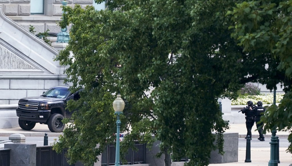 Authorities apprehended Floyd Ray Roseberry of Grover, North Carolina, who parked a pickup truck on the sidewalk in front of the Library of Congress' Thomas Jefferson Building, as seen from a window of the U.S. Capitol on Aug. 19, 2021, in Washington. (AP