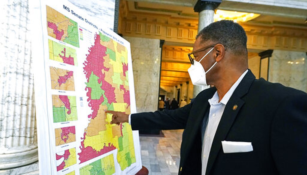 Mississippi state Sen. Sollie Norwood, a Democrat, in the Capitol rotunda in Jackson on Aug. 26, 2021. The map depicts census growth or loss in each of the Mississippi Senate districts. (AP)