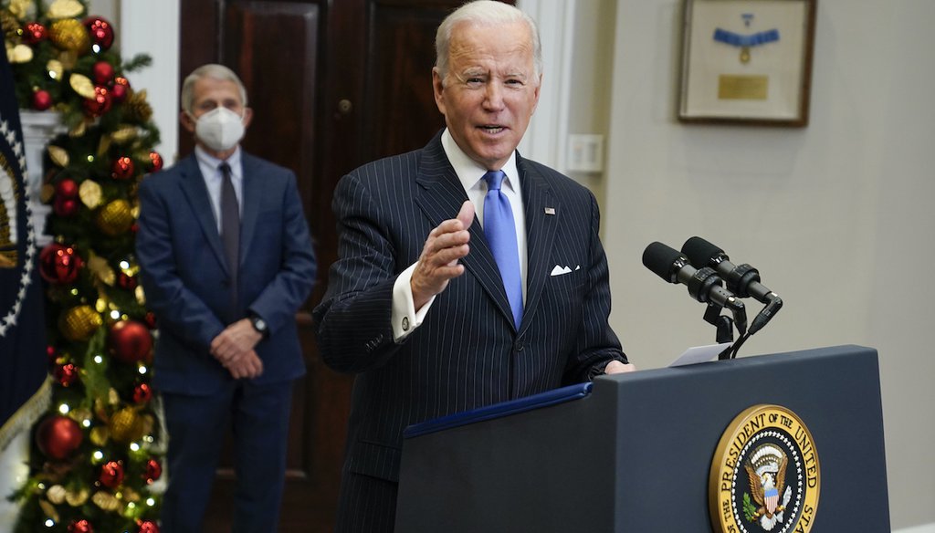 President Joe Biden speaks about the COVID-19 variant named omicron at the White House, Monday, Nov. 29, 2021, in Washington, as Dr. Anthony Fauci, director of the National Institute of Allergy and Infectious Diseases listens. (AP)