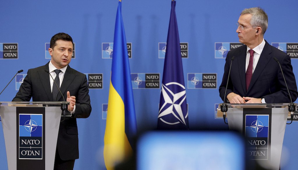 Ukraine President Volodymyr Zelenskyy and NATO Secretary General Jens Stoltenberg participate in a media conference at NATO headquarters in Brussels on Dec. 16, 2021. (AP)