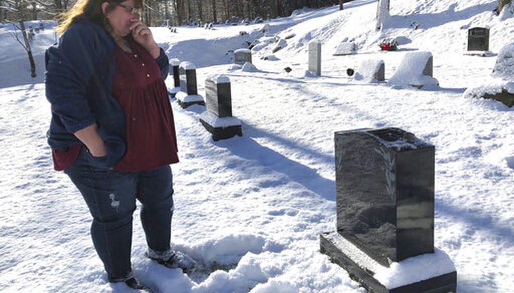 Deb Walker, of Chester, Vt., visits the grave of her daughter Brooke Goodwin, on Dec. 9, 2021. Goodwin, 23, died in March 2021 of a fatal overdose involving fentanyl. (AP)