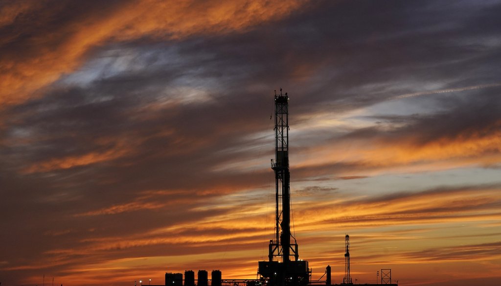 Oil drilling rigs are pictured at sunset, March 7, 2022, in El Reno, Oklahoma. (AP)