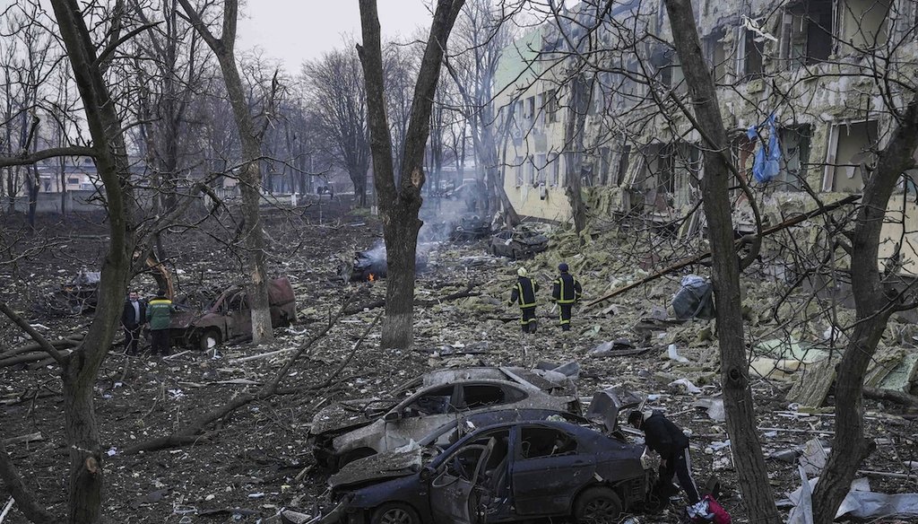 Ukrainian emergency employees work at a maternity hospital damaged by shelling in Mariupol, Ukraine, on March 9, 2022. (AP)