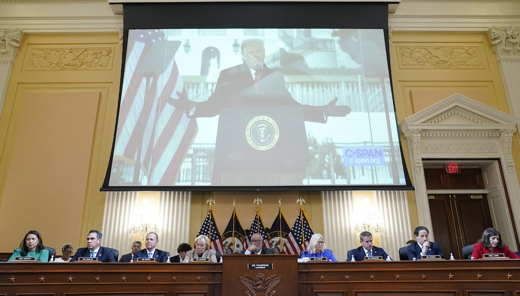 A video of former President Donald Trump speaking during a rally on Jan. 6, 2021, is shown as committee members look on during a public hearing of the House select committee investigating the attack on Capitol Hill on June 9, 2022, in Washington. (AP)