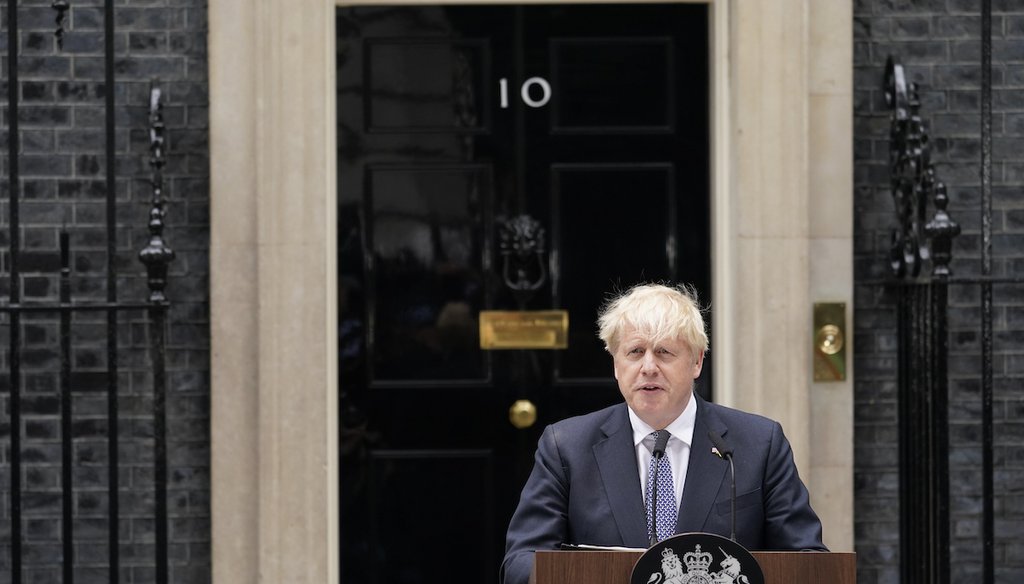 British Prime Minister Boris Johnson speaks to media next to 10 Downing Street in London on July 7, 2022. (AP)
