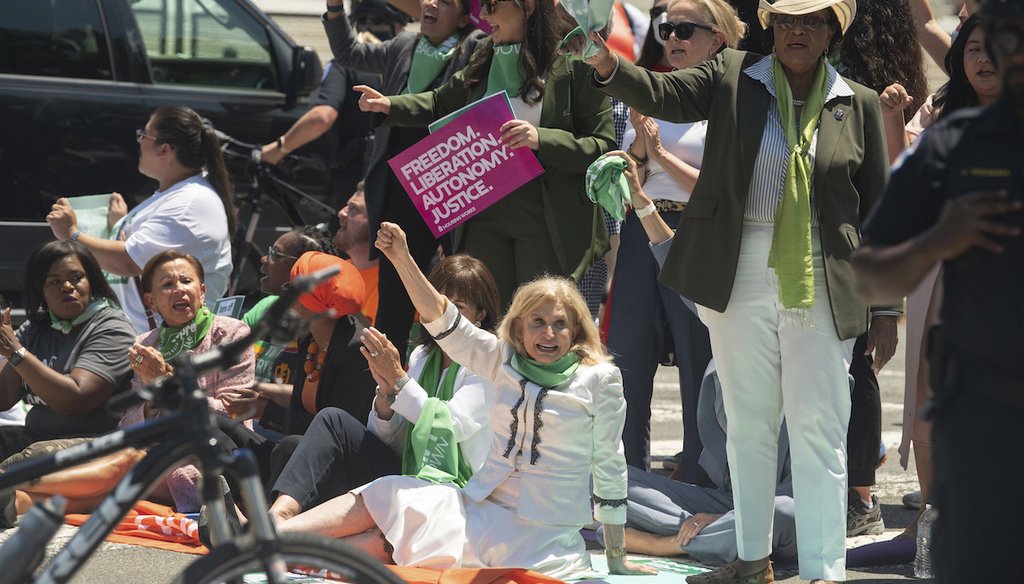 Members of Congress and activists demonstrate for abortion rights in front of the Supreme Court on July 19, 2022 in Washington. (AP)